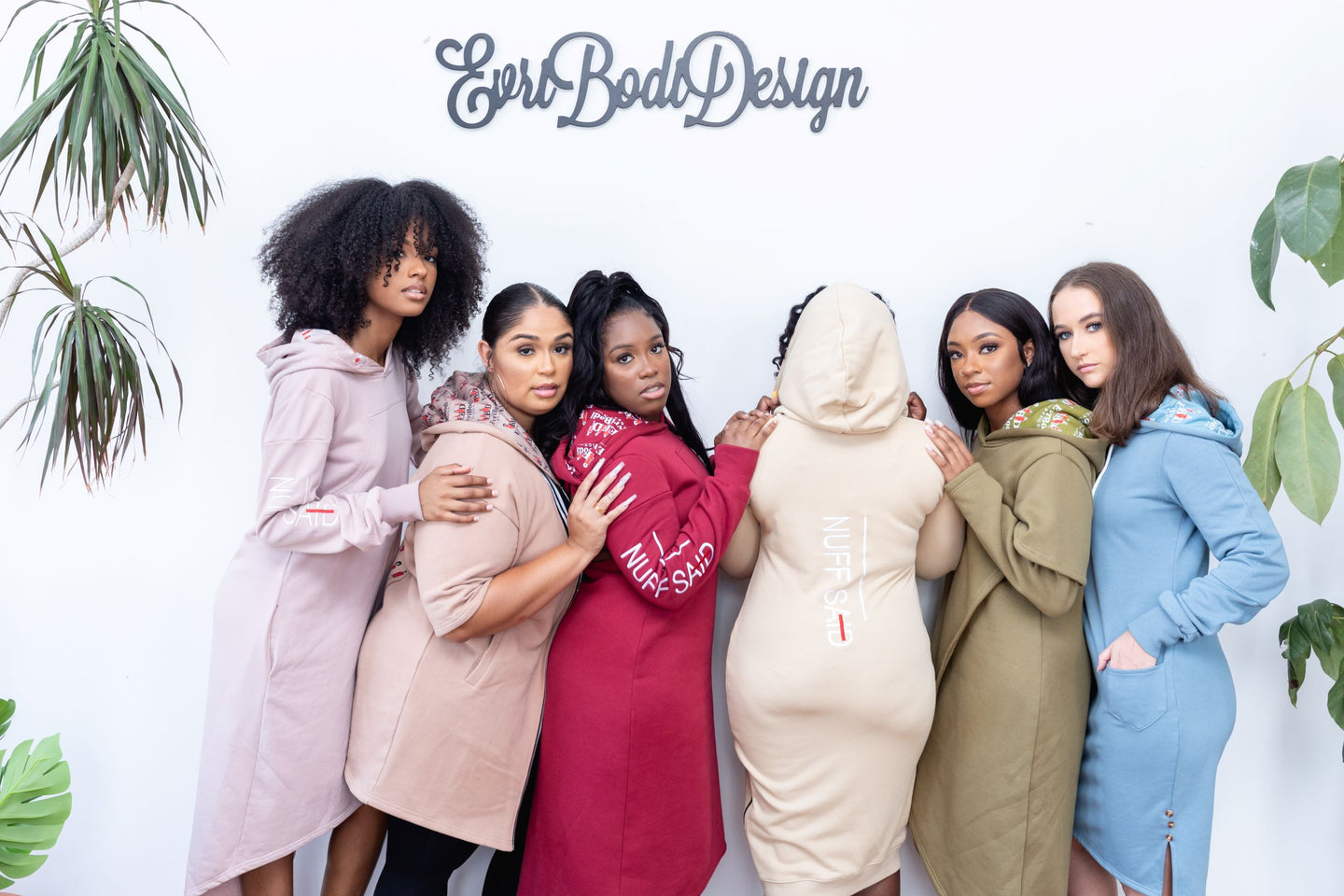 Models wearing size small in dresses shown.